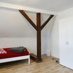Zimmer Azubi-WG mit Bett und Schrank